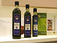 Le bottiglie in vetro scuro con cui confezioniamo l'Olio Extravergine d'Oliva IGP Toscano del Castello di Grotti - Siena